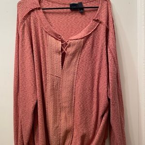 Rust color with long sleeves and elastic band.